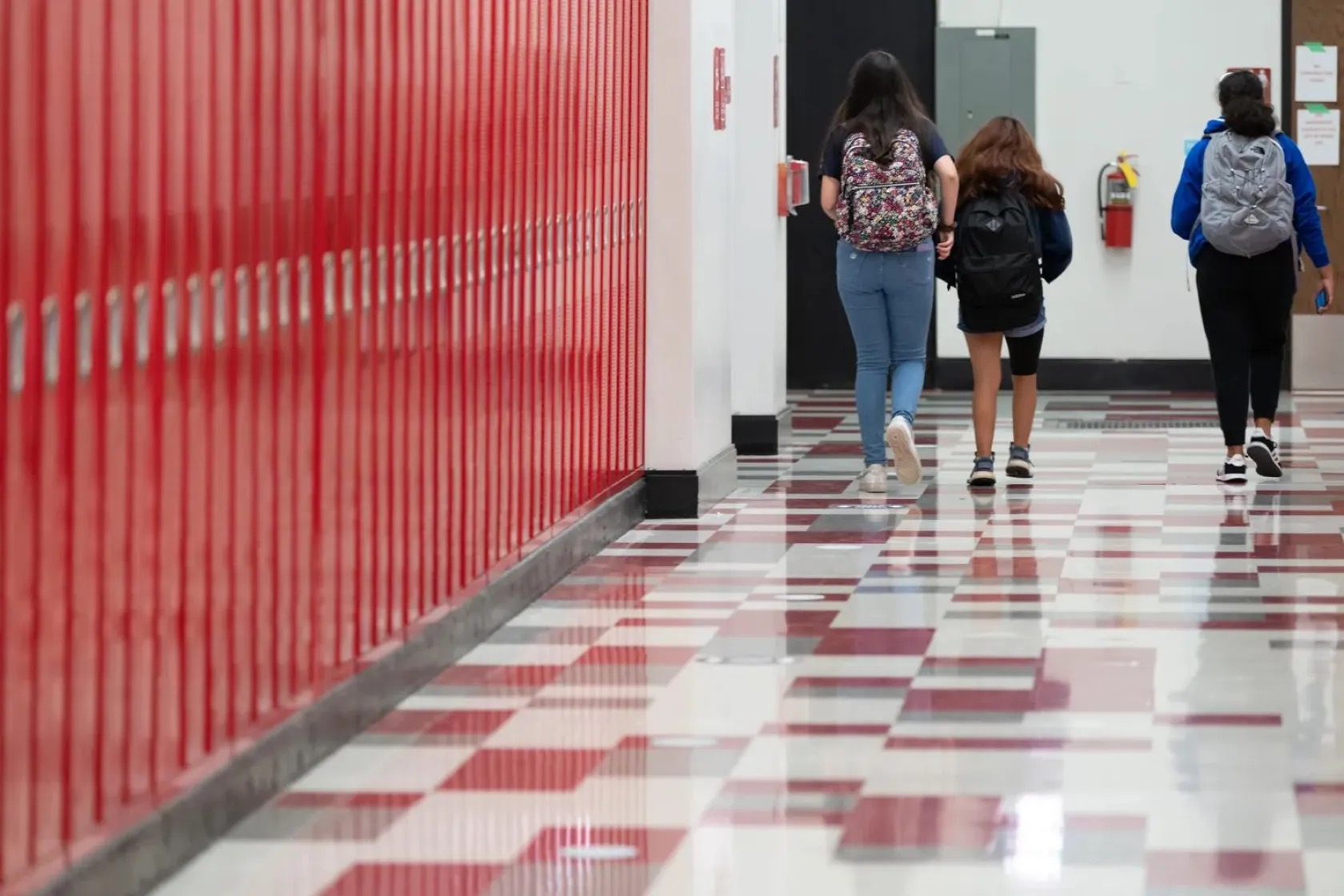 Students walk the hallway at Lake View High School in Chicago