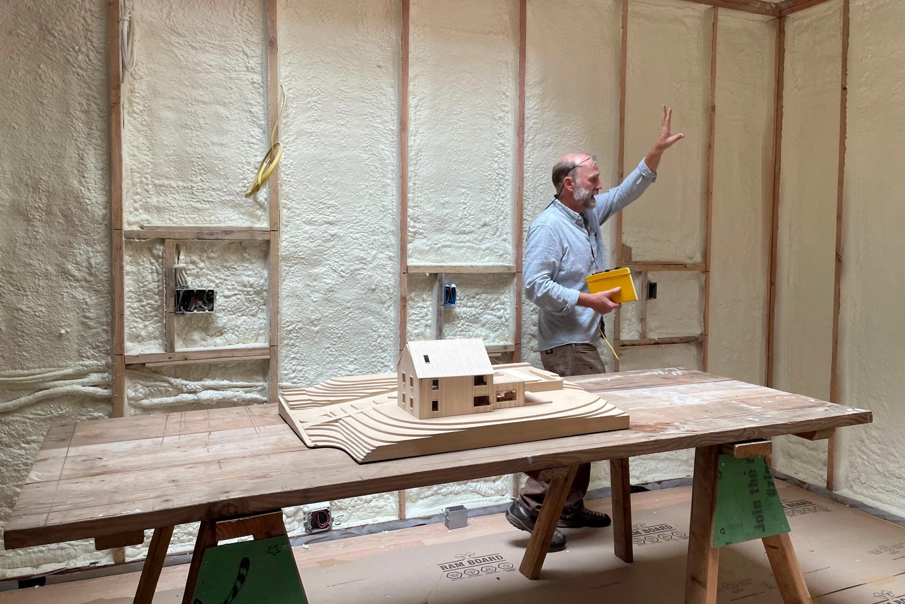 Adam Hopfner of the Yale School of Architecture tours a two-family home on Howard Street in New Haven. The home will house teachers at the Friends Center for Children and their families.